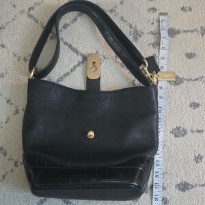 Coach Black and Gold Shoulder Bag with Classic Design